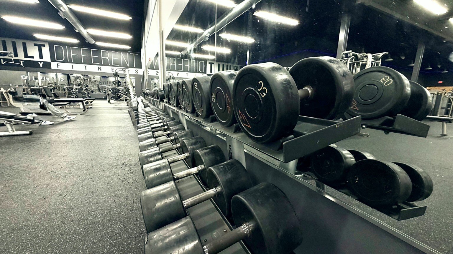 Free weights and dumbbell racks at City Fitness in Lexington, NC