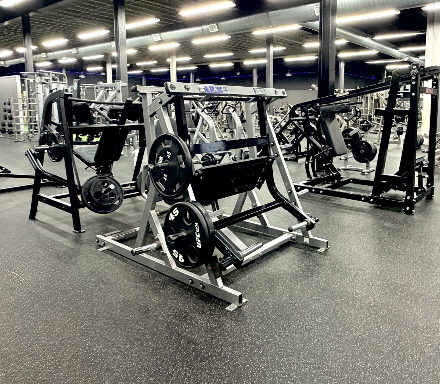 Plate-loaded strength equipment at City Fitness in Lexington, NC